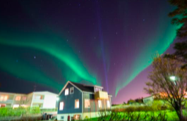 Northern Lights above Blue House